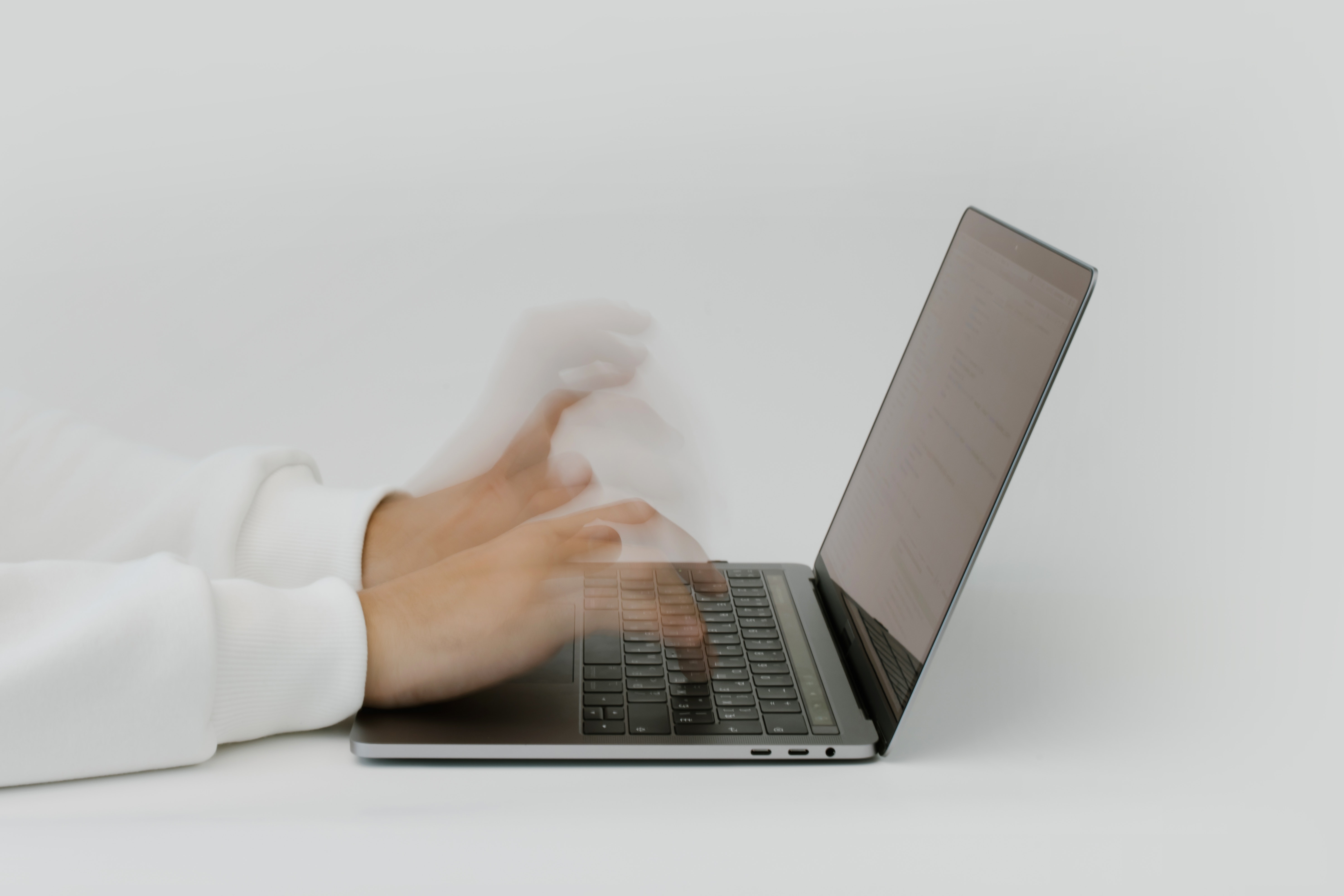 A person using a laptop to manage an email marketing campaign
